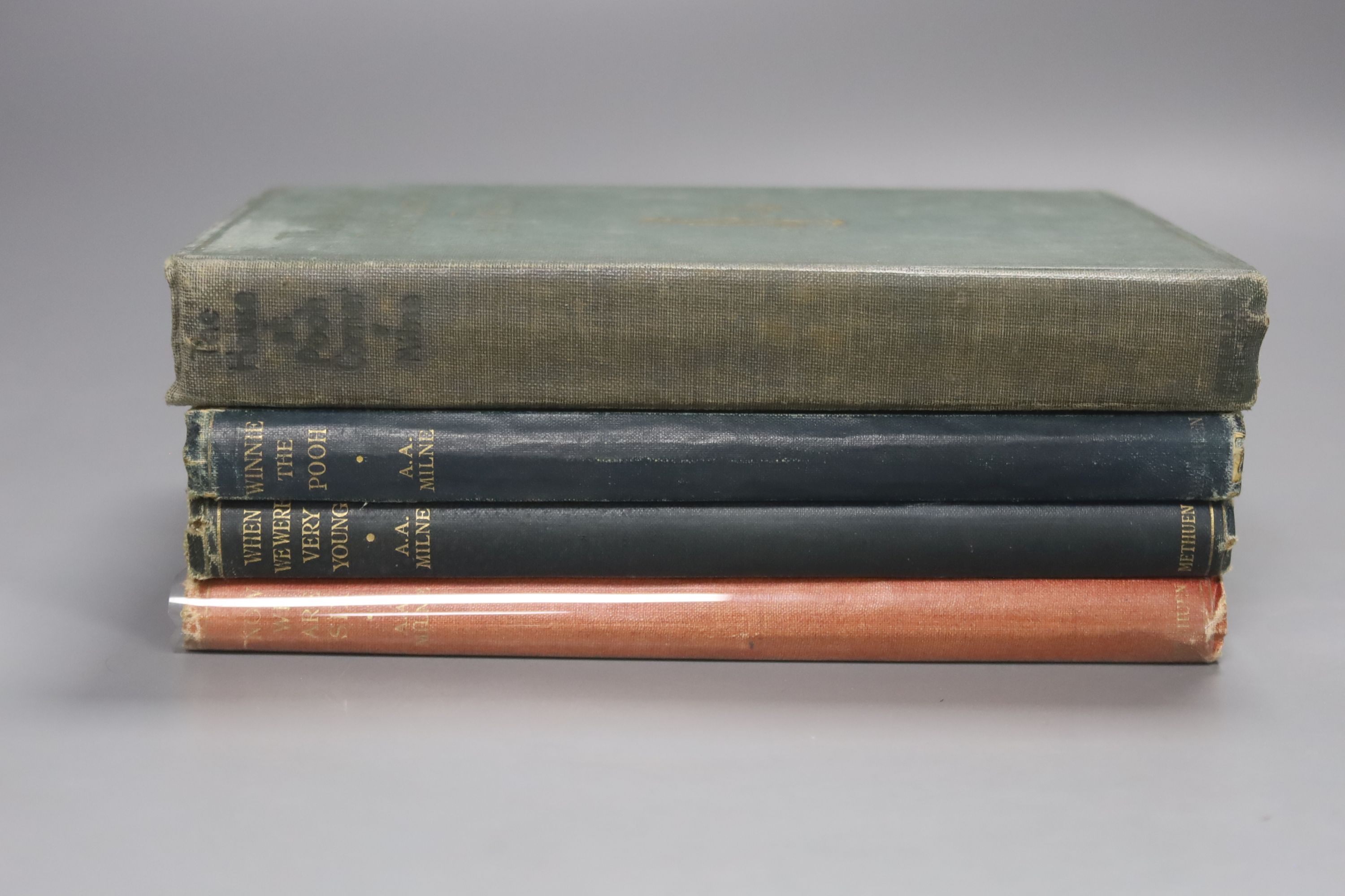 Milne, A.A – Winnie The Pooh, second edition, 8vo, cloth bound, (dj missing, inscribed, scuffs to covers, internal break to the spine) Methuen, London 1926., Milne, A.A – The House At Pooh Corner, first Canadian edition,